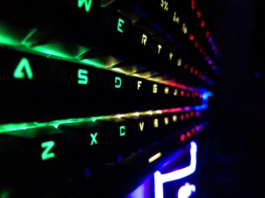 a glowing rainbow gaming keyboard