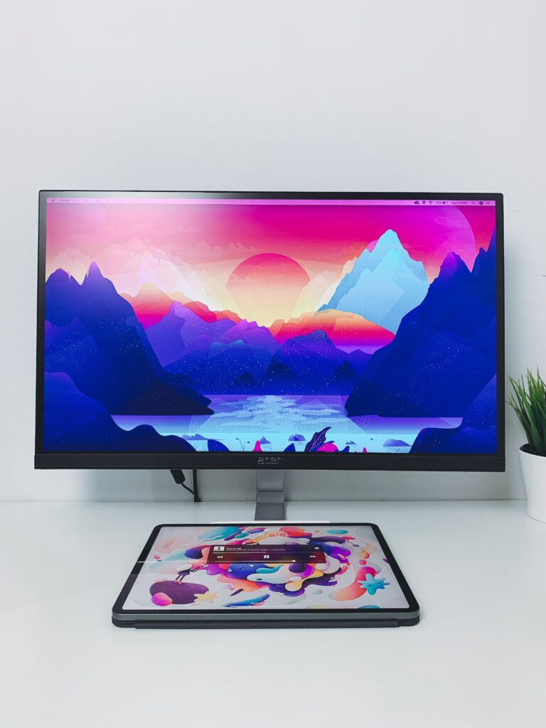 A high resolution monitor with a portable monitor below it