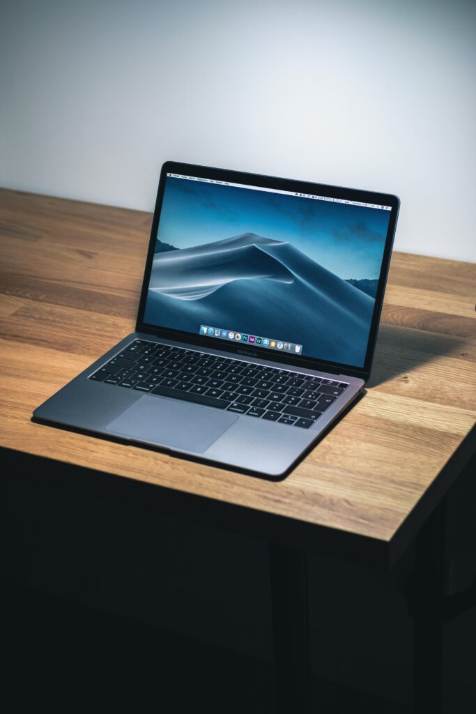 Macbook laptop sitting on a desk