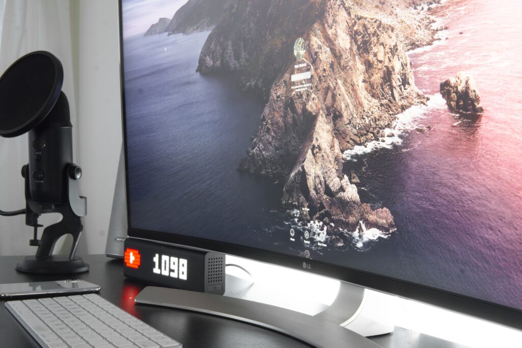 curved monitor sitting on a desk