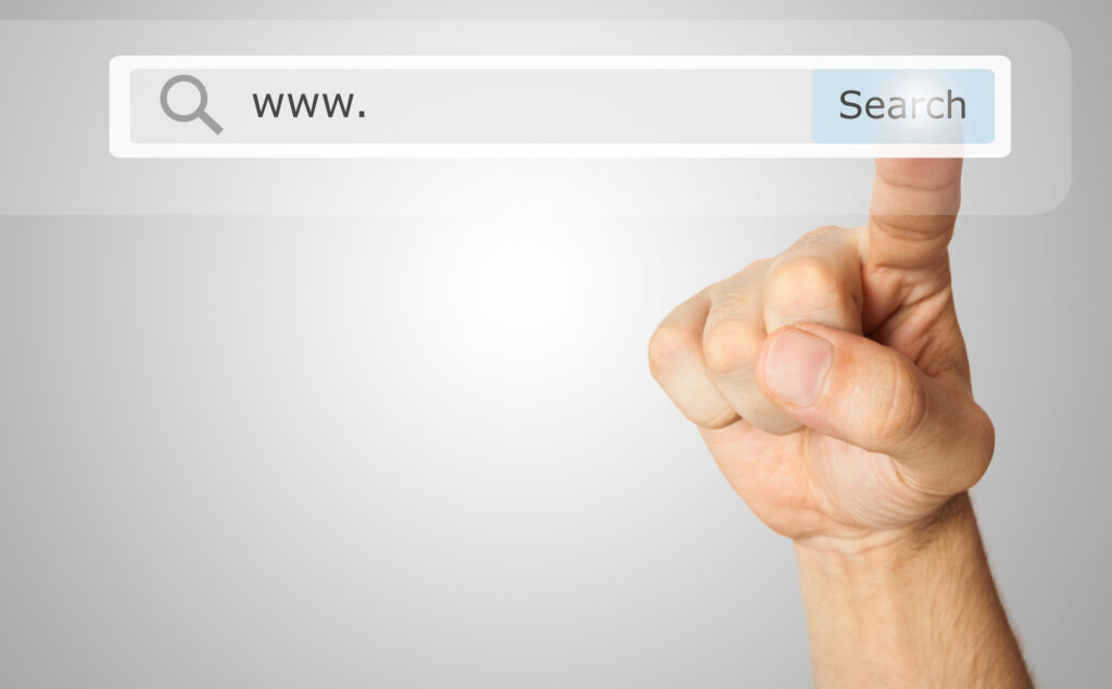 Finger hover over search bar, getting ready to search for a website